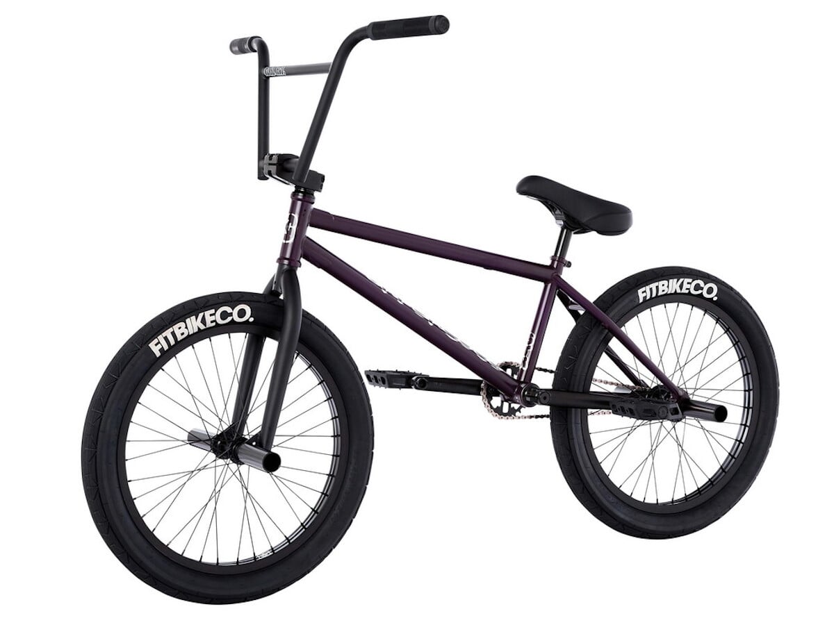 white and purple bmx bikes