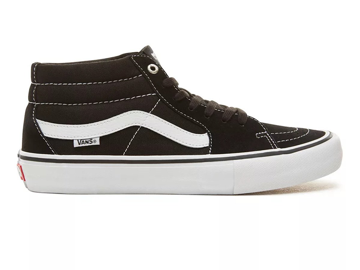 black and white shoes vans